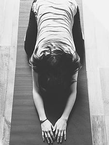 woman kneeling on yoga mat thumbnail