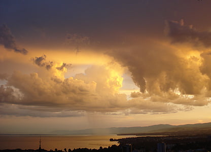 city near sea during golden hour thumbnail