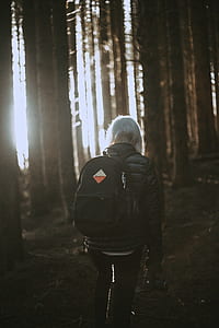 person wearing black bag thumbnail