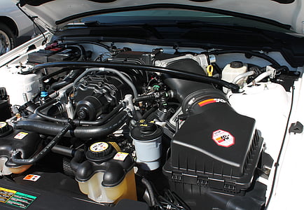 gray and black vehicle engine inside bay thumbnail
