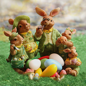 close photography of dressed kangaroo family figurine set thumbnail