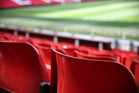 selective focus photography of stadium bleachers thumbnail