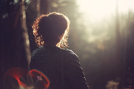 selective focus photo of a woman wearing blue collared top thumbnail