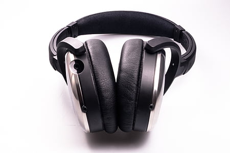 black and grey wireles headphones on white surface thumbnail