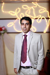 Man in Grey and Pink Suit thumbnail