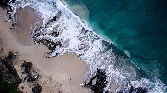 aireal view of seashore during daytime thumbnail