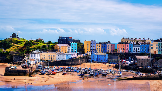 aerial photography of multicolored buildings in front of beachshore thumbnail