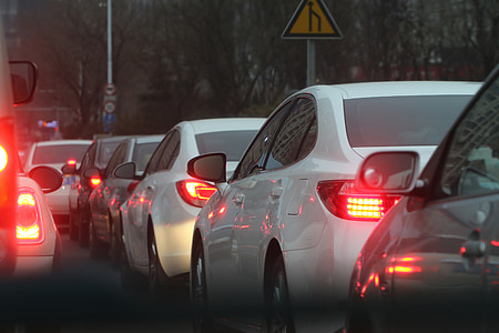 vehicles on road during daytime thumbnail