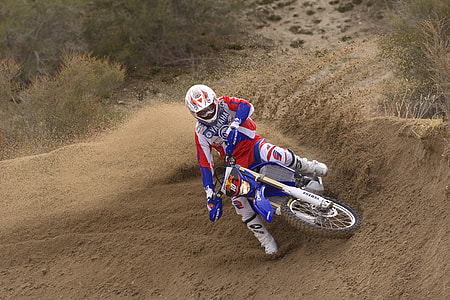 man riding dual-sport motorcycle thumbnail
