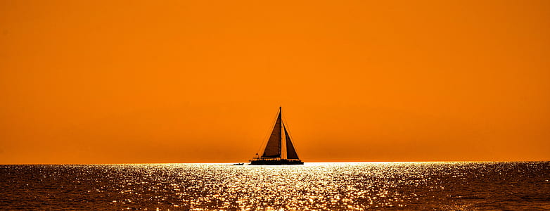 silhouette of sailing boat in the sea thumbnail