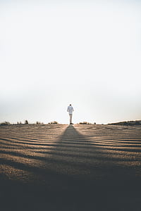 person standing on the open ground thumbnail