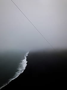 aerial view of seashore with fogs thumbnail