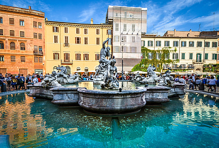 people standing beside fountain thumbnail