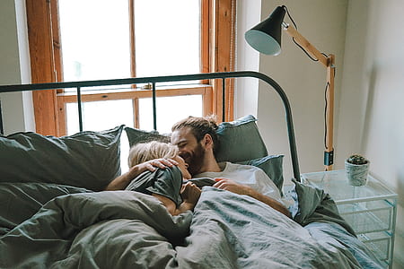 man and human lying on bed and hugging thumbnail