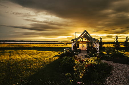 brown gazebo near on body of water thumbnail