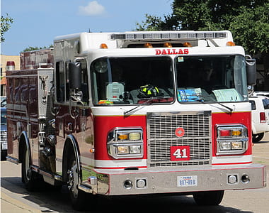 white and red Dallas firetruck on pavement at daytime thumbnail