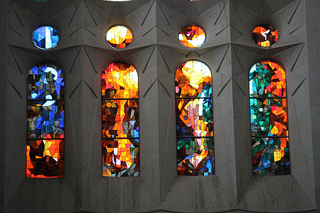 architectural photography of four stained glass windows thumbnail