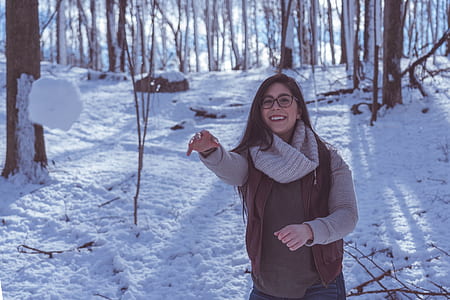 woman raising forward her right arm thumbnail