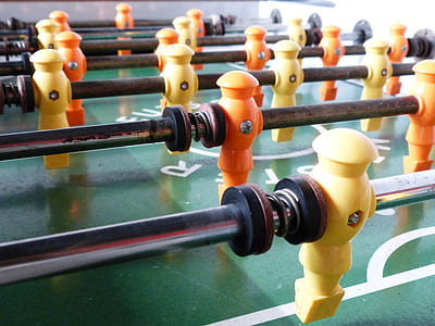 close-up photography of foosball table thumbnail