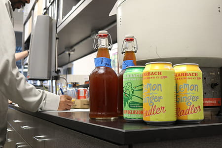 Two Yellow Lemon and Ginger Soda Cans thumbnail