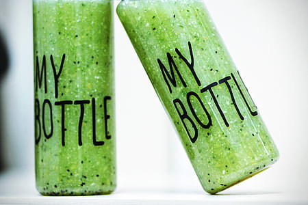 two green glass bottles thumbnail