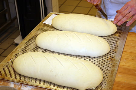three bread dough on tray thumbnail