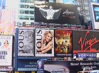 billboards on building at daytime thumbnail