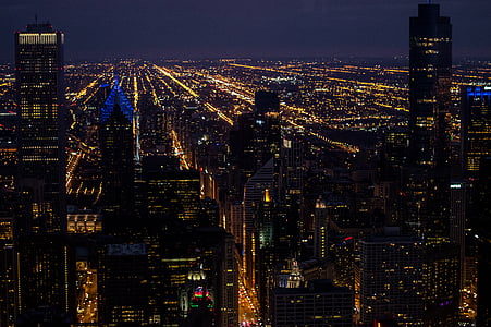aerial view of buildings during nighttime thumbnail