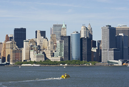 assorted-color high-rise building under blue sky at daytime thumbnail