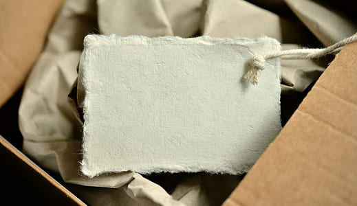 white and brown cardboard box thumbnail