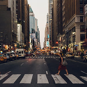 woman walking on pedestrian lane thumbnail