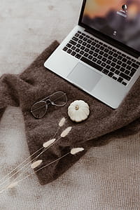 Laptop, glasses & small white pumpkin thumbnail