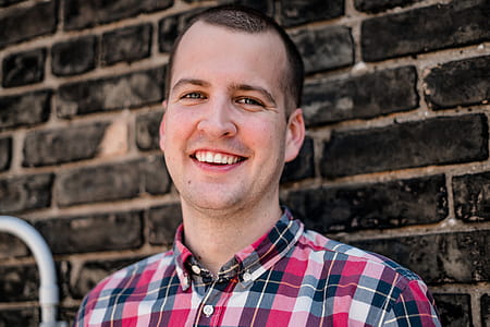 Portrait Of A Young Man Smiling Photo thumbnail