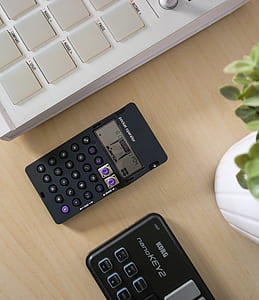 black calculator near Korg Nanokey2 thumbnail