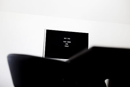 flat screen TV on white wall thumbnail