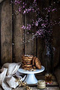 brown cooking on gray cake stand near wall thumbnail