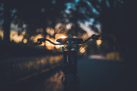 silhouette photo of bicycle during sunrise thumbnail