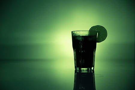 drinking glass filled by juice photograph thumbnail