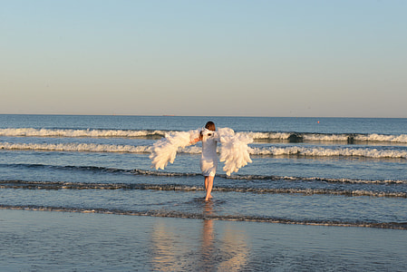 woman walks on body of water thumbnail
