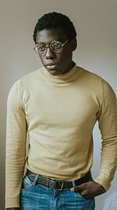 man wearing eyeglasses and yellow long-sleeved shirt thumbnail