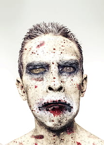 man with face paint portrait thumbnail