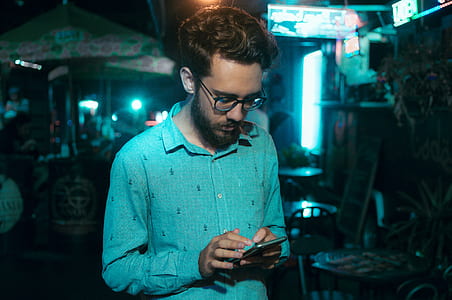 man, person, night, smartphone thumbnail