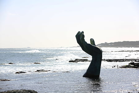 black hand statue thumbnail