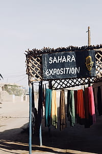 assorted-color textiles hanging on clothesline thumbnail