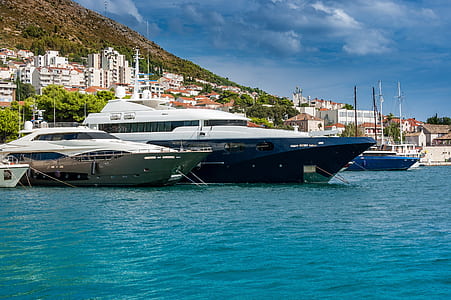 white docked yachts thumbnail