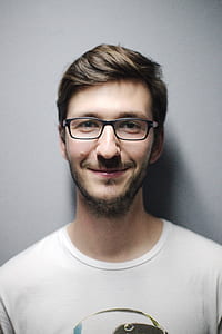 photo of man in white shirt wearing eyeglasses thumbnail
