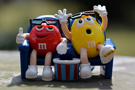 M&M's character sitting on sofa thumbnail