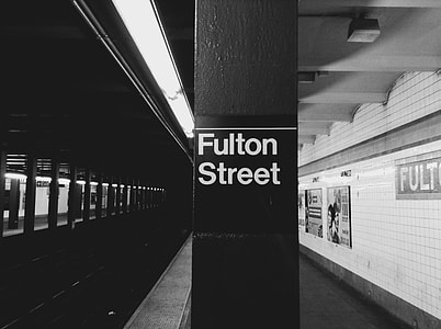 grayscale photography of Fulton street train station thumbnail