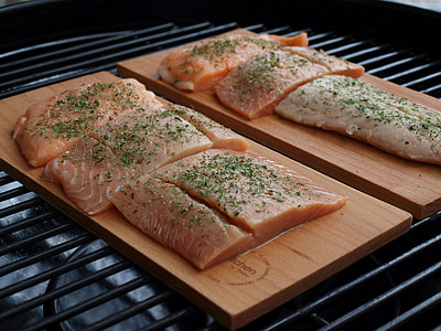six sliced raw meats with green seasoning on top thumbnail