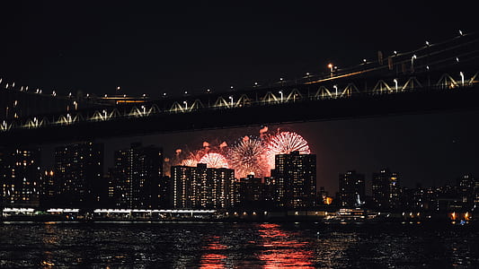 photography of fireworks over building thumbnail